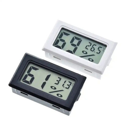 Máy đo nhiệt độ kỹ thuật số mini LCD trong nhà 2 pin nút DC 1.5V LR44